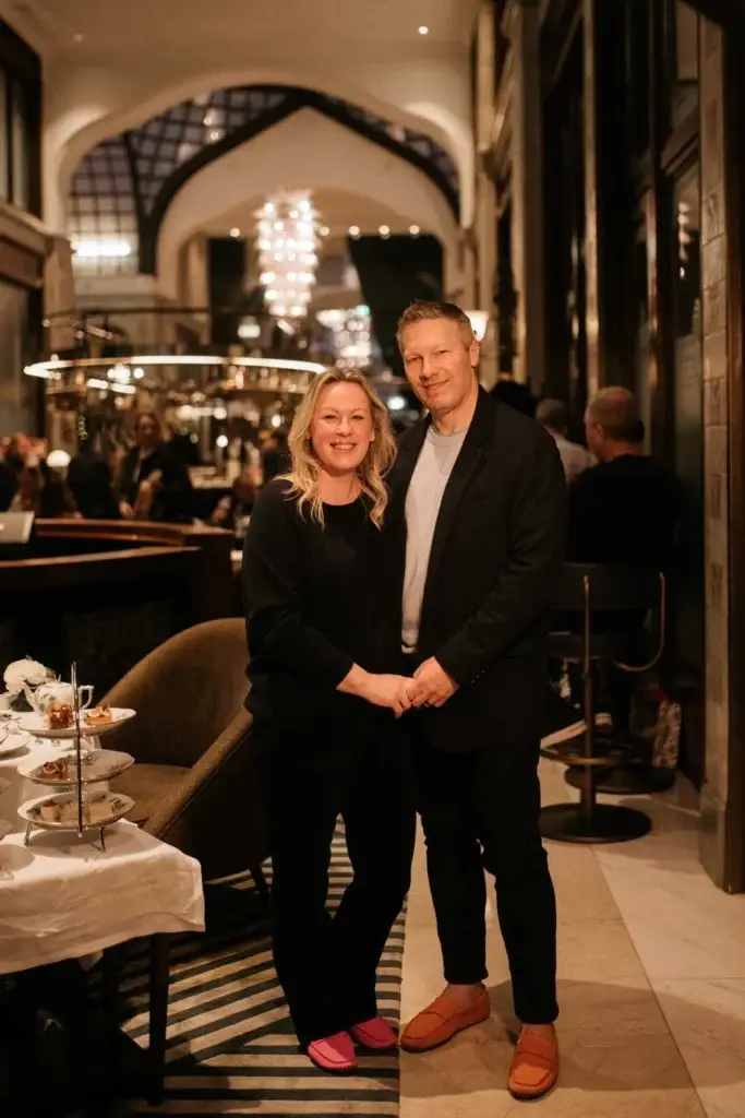 Photo-of-smiling-couple-posing-together-in-elegant-luxury-cruise-ship-dining-lounge
