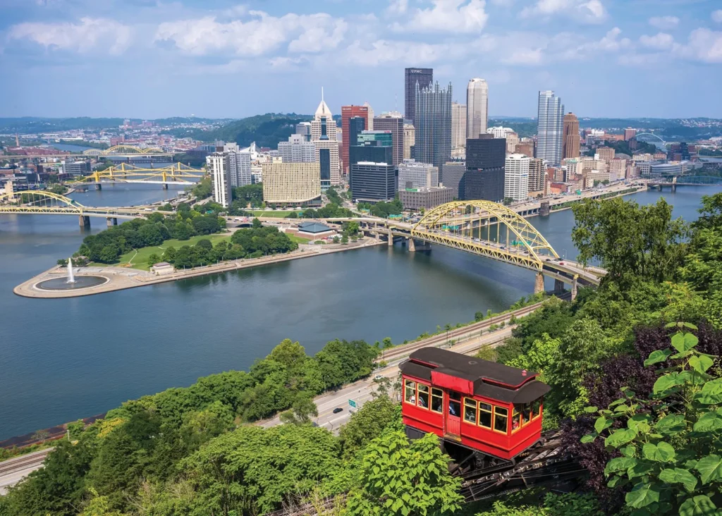Photo of Duquesne Incline car overlooking Pittsburgh skyline and river